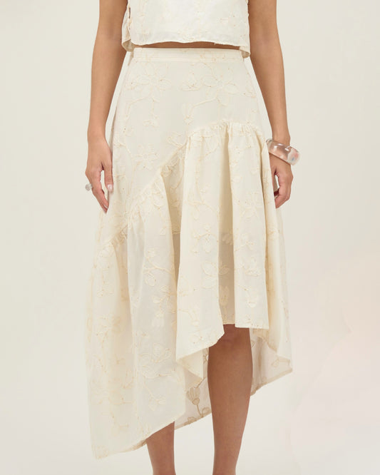 SAIA MIDI BORDADO RECORTE ASSIMÉTRICO BEGE