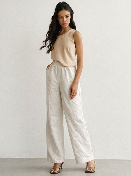 CALÇA COM BOLSOS OFF WHITE