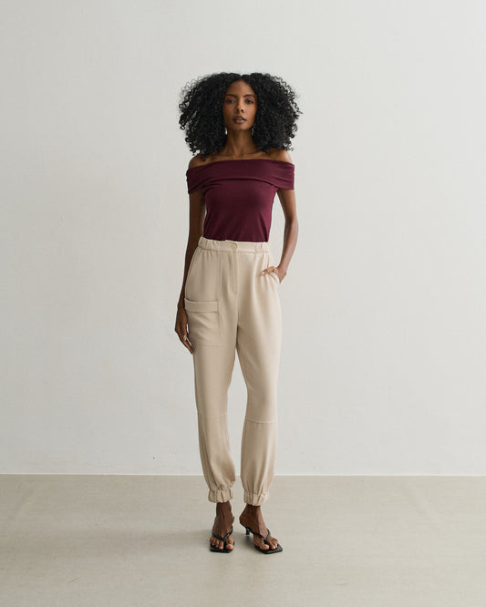 CALÇA COM ELÁSTICO BARRA E BOLSO LATERAL BEGE